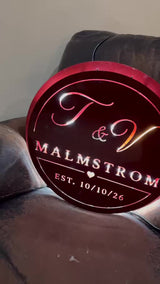 Actual finished red T & V Malmstrom backlit wedding sign
