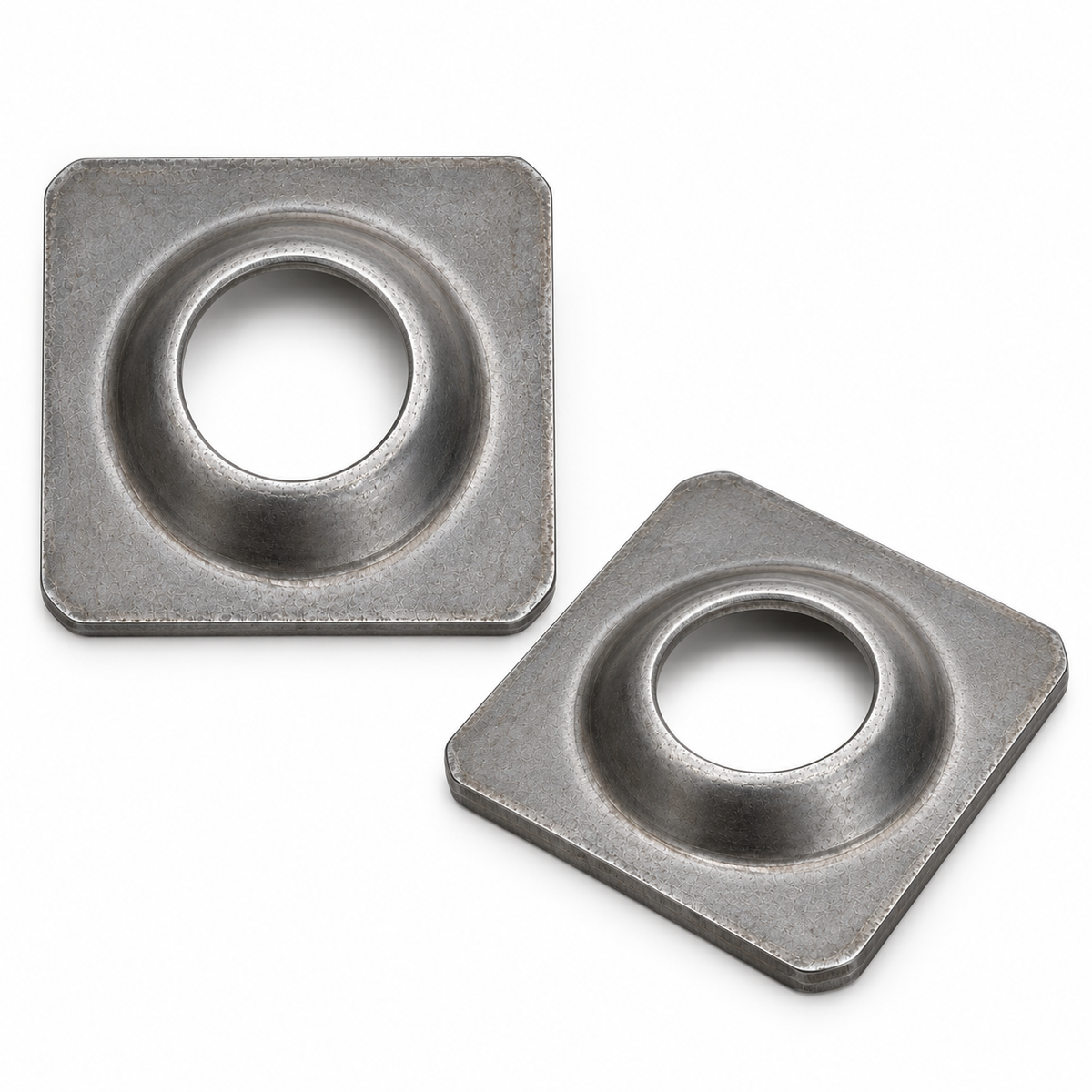 Pair of J Fab dimple-died tube mounting feet in bare steel