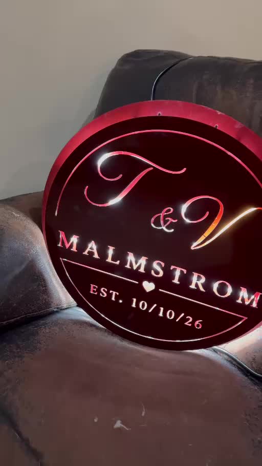 Actual finished red T & V Malmstrom backlit wedding sign